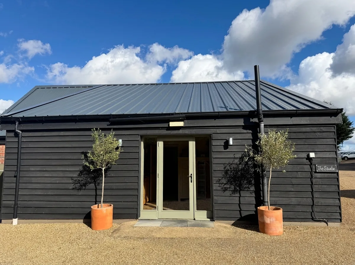The outside of The Painted Barn, where you arrive